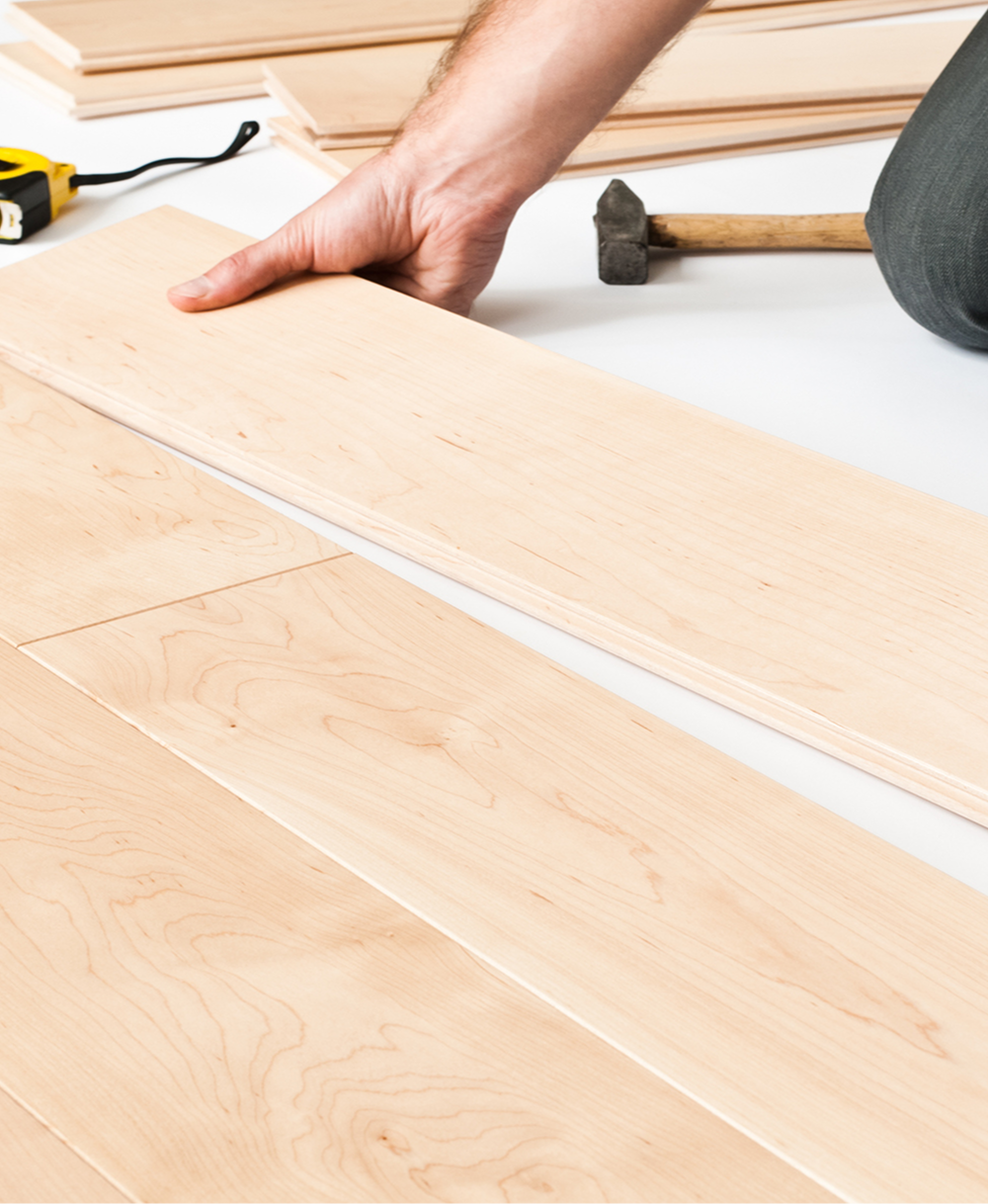 Laying wooden panels on floor